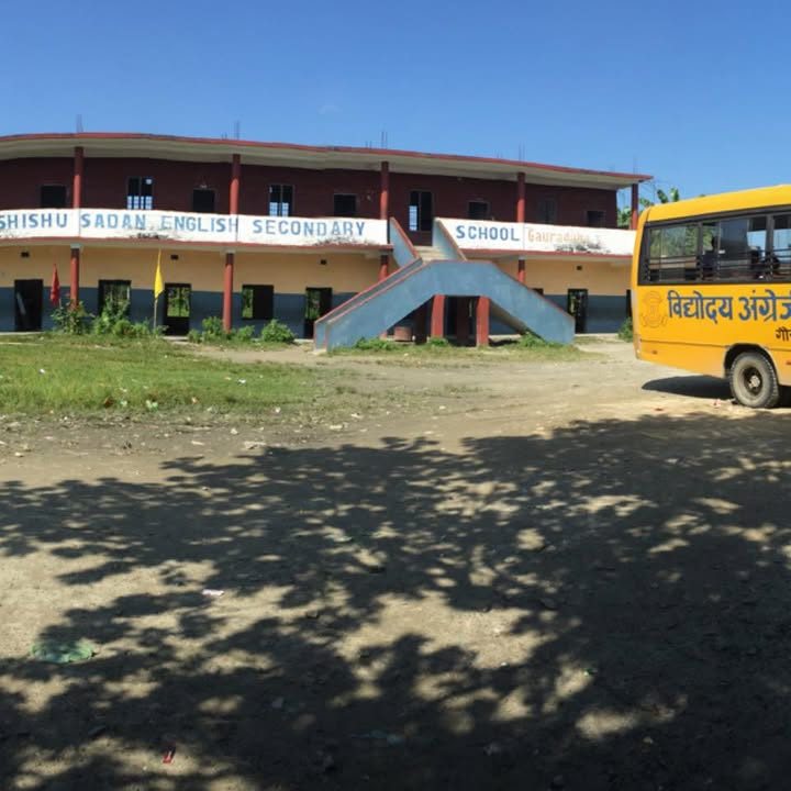 Shree Vidhyodaya Shishu Sadan School Campus building and yellow school bus in Gauradaha-02, Jhapa